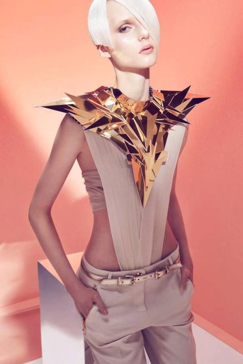 Futuristic accessories in this geometrical-inspired session are by Halina Mrozek. Photography Łukasz