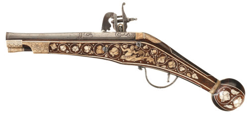 A very lovely 16th or 17th century wheel-lock pistol with scrimshaw decorated ivory stock inlays.