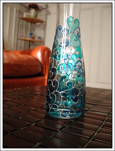 Flower Vase - A glass paint project with three different shades of blue highlighted with silver lining.