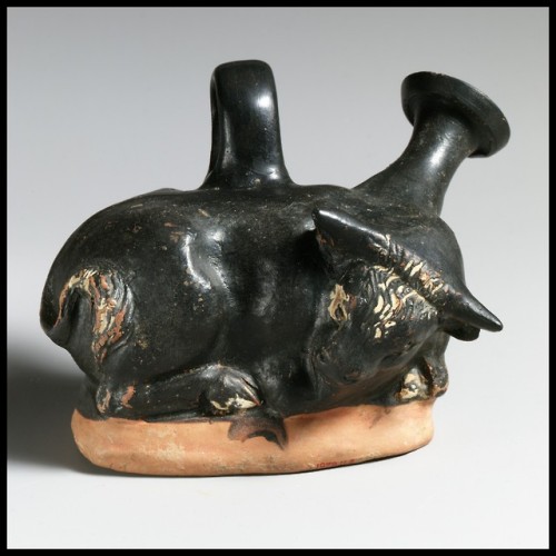 Apulian terracotta askos (flask with spout and handle) in the shape of a bull.  Artist unknown; 4th 