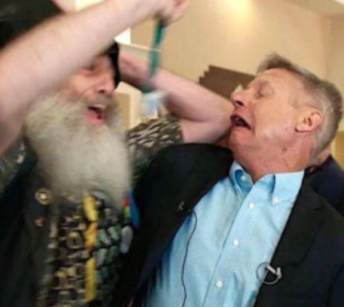 leftist-daily-reminders:Look at this picture of Vermin Supreme yelling at Gary Johnson.I never asked