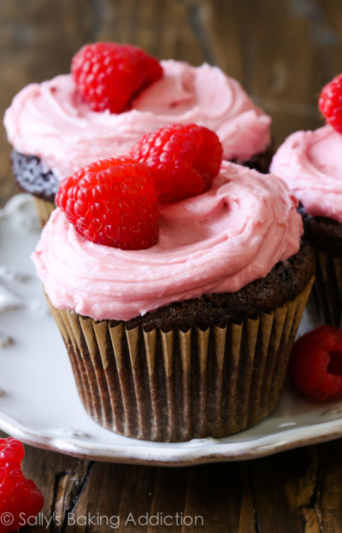 sweetoothgirl:  Chocolate Cupcakes with Creamy Raspberry Frosting
