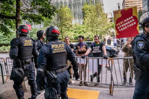 Federal Agents provide law and order in Portland, Oregon.