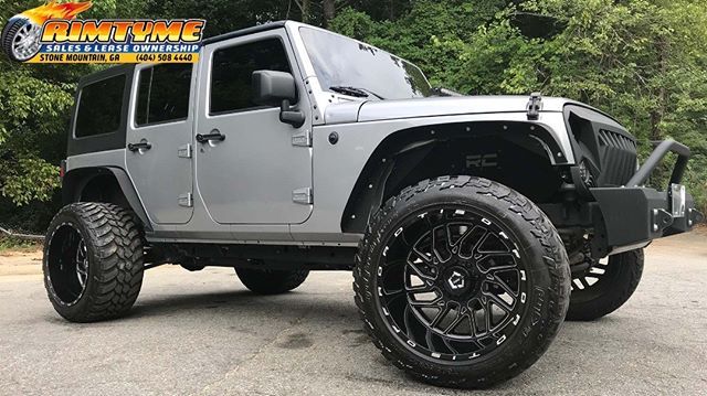 RimTyme Custom Wheels & Tires — Jeep Wrangler sitting on 22” TIS Off Road  F51BM1...