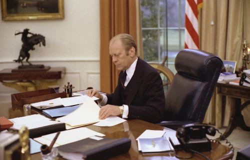 President Ford works in the Oval Office on January 27, 1976.
-from the Ford Library