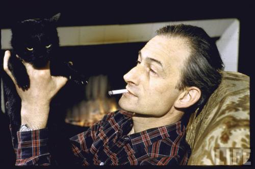 peoplewithcats:Balthus, cigarette in mouth, holding pet cat Orphee, at home in the Chateau de Chassy