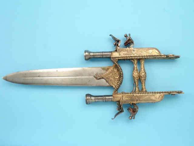 peashooter85:  Rare brass handled katar dagger mounted with two flintlock pistols,