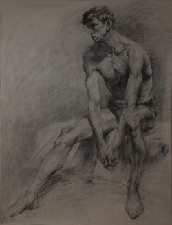 A charcoal master study of a figure drawing