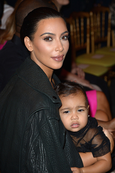 kuwkimye:Kim & North at the Givenchy show - September 28, 2014