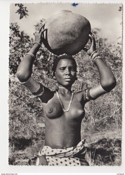Giriama woman, via Delcampe.   