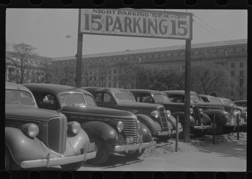 1939. “Washington, D.C. An automobile parking lot on 14th Street, back of the Department of La