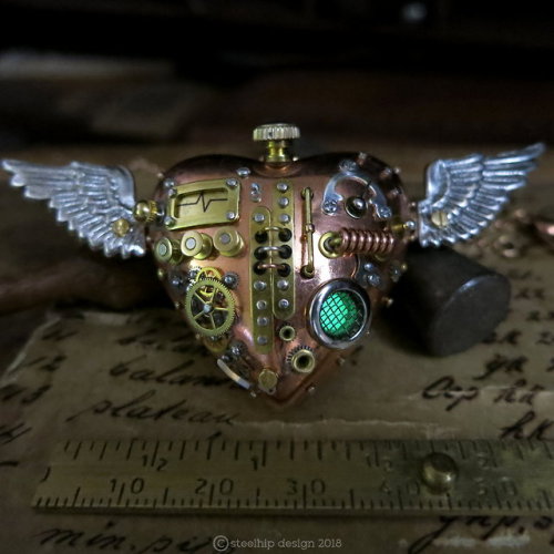 Silver wing heart - my latest winged mechanical heart with gears, gauges and glow in the dark grill.