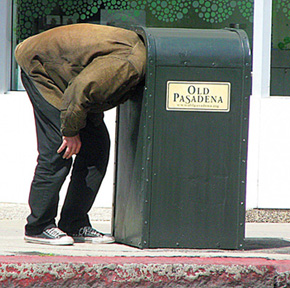 The Signs as people in trash cans
