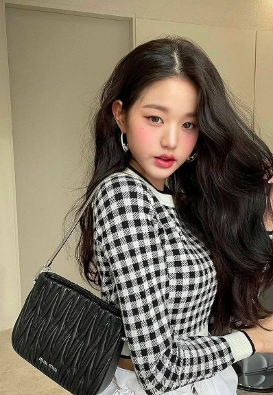 IZONE’s Wonyoung wearing MIU MIU sassy matelassé nappa leather handbag $2,800 AUD for t