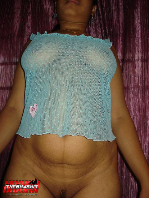 thebhabhis:  Desi Aunty in a blue transparent lingerie topsYou can get to know us a little better now by following us on Twitter. 
