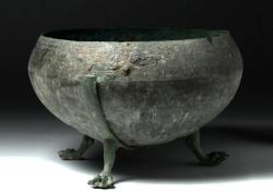 archaicwonder:  Large Urartian Bronze Cauldron with Feline Feet, 8th-6th Century BC Urartu is famous for its bronze cauldrons and their decorations, which  were cast separately and added to the relatively simple cauldron forms.  These decorations included