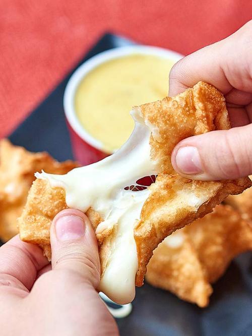 boozybakerr:Cheese Wontons with Honey Mustard Dipping Sauce