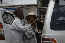 Man-Woman beggar team soliciting donation.