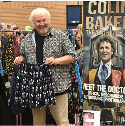 Colin Baker admiring my wares at Tonbridge comicon, wearing the Cyberman shirt I made him. He got th