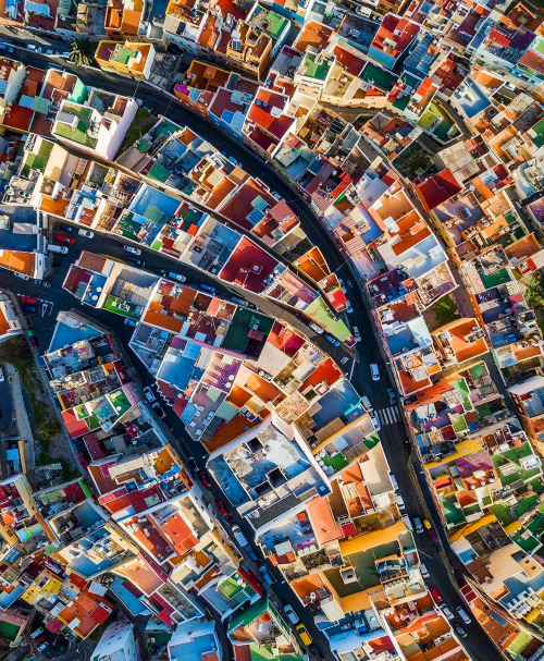 dailyoverview:Colorful rooftops are seen in the San Juan District of Las Palmas, Canary Islands, Spa