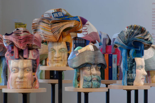 archiemcphee:  What do you do with old telephone books, or even current telephone books, for that matter? While many of us end up using them as impromptu doorstops and footstools or simply pitch them straight into the recycling bin, New York-based artist