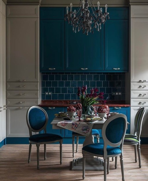 Don&rsquo;t shy away from deep colours- using a dark colour throughout a room can help unite you