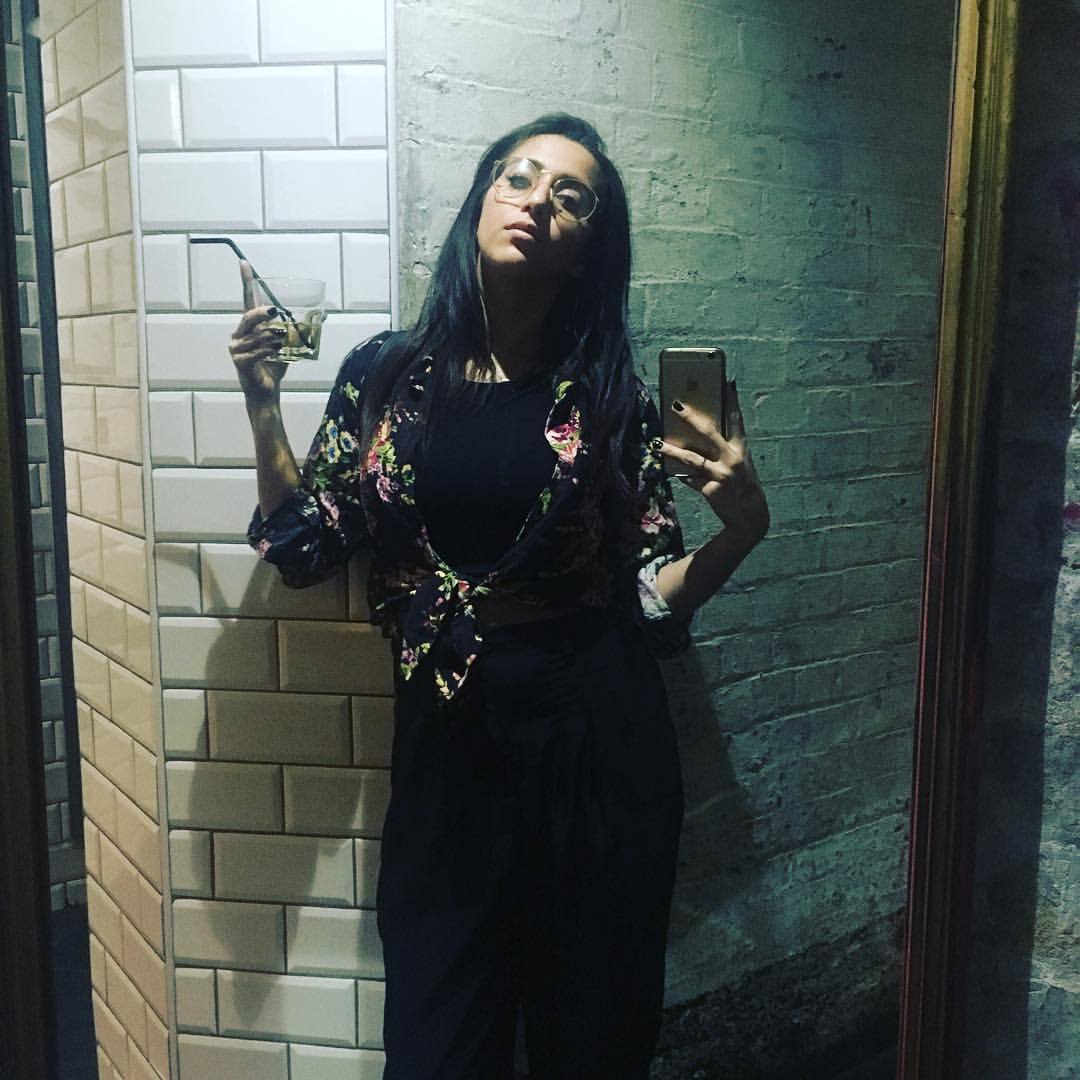 Trying to feel cool with a bendy straw in scotch in a foreign country 
