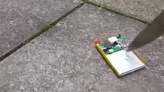 sizvideos:  Why you should never poke a phone battery with a knifeVideo