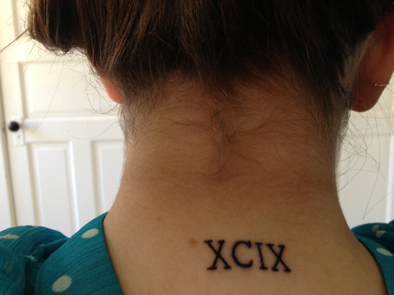 oh baby — here's a picture of my new tattoo XCIX; 99 in...