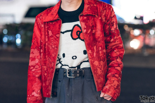 tokyo-fashion:  17-year-old Japanese student Kaoru on the street in Harajuku. He is wearing a CONTENASTORE jacket over a Hello Kitty knit sweater, paint-splattered Japanese construction pants (nikka pokka), and red heeled boots. Full Look