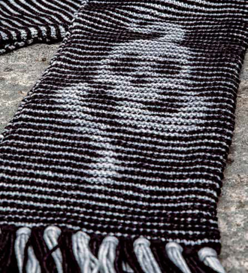Dark Mark Illusion Scarf by Lyndsay Henricks.Pattern available for purchase: Knitting Magic: The Off