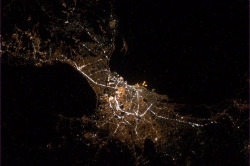 colchrishadfield:  At long last - Manila, capital of the Philippines, delicately shining in the night. 