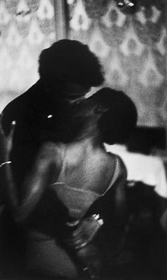 theniftyfifties:  Couple kissing at a dance,