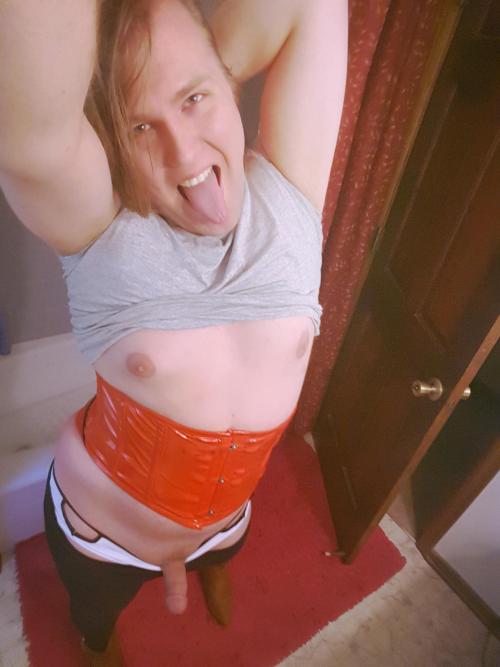 ta6769:  I got a bit flirty with a camera today. The return of my red waist cincher! Also, kinda looks like I have boobs. 