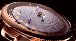 staceythinx:  The Midnight Planétarium watch was a collaboration between Van Cleef &amp; Arpels and Christiaan van der Klaauw. The watch is made of 396 separate parts and features the six closest planets orbiting the sun in real time (Uranus and Neptune