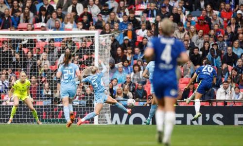 Sam Kerr scores a brace against Manchester City in the FA Cup final.First goal:Brother: What a goal.