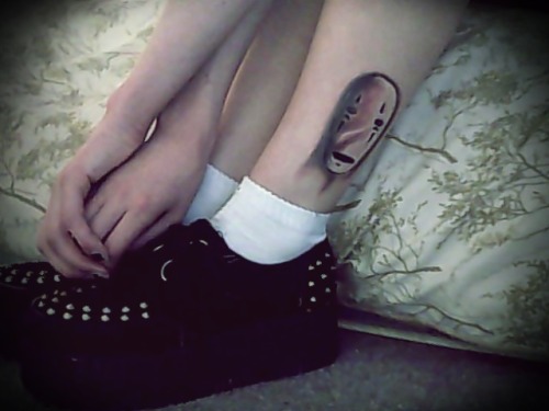 never-enough-books:  Absolutely in love with my new tattoo. My gorgeous little No-Face spirit. 