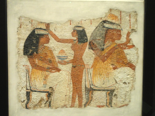 Ancient Egyptian banquet scene, painted on straw and mud.  Artist unknown; ca. 1400 BCE (New Ki