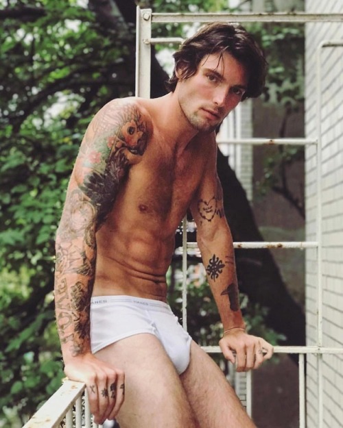 summerdiary:Charlie on the fire escape by @william_graper  (at New York, New York)