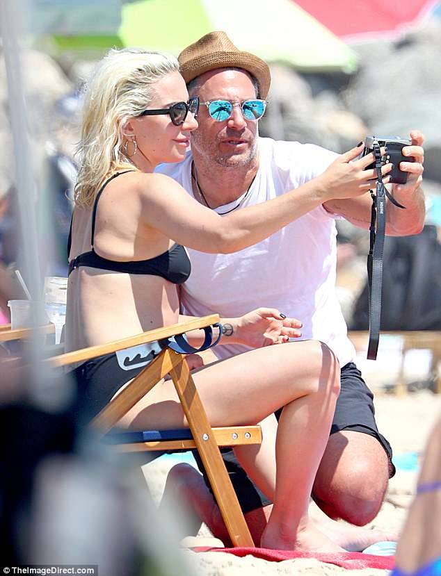 gagamedia:  July 1: Lady Gaga and Christian Carino at the beach in The Hamptons.