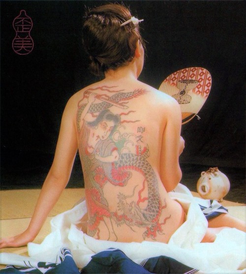 Traditional Japanese tattoo artist Horibun I at work in Tokyo, circa 1970s.