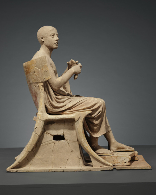 Statue of a seated poet (Orpheus?)Greek (from Tarentum), Early Hellenistic Period, 330-300 B.C.terra