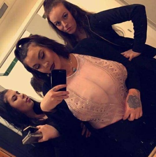 Barely covering her nipples