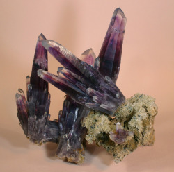 lapidarist:  quartz with amethyst phantoms