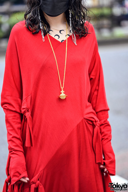 Japanese artist Miyu on the street in Harajuku wearing a ribbon dress by Japanese fashion brand LIMI