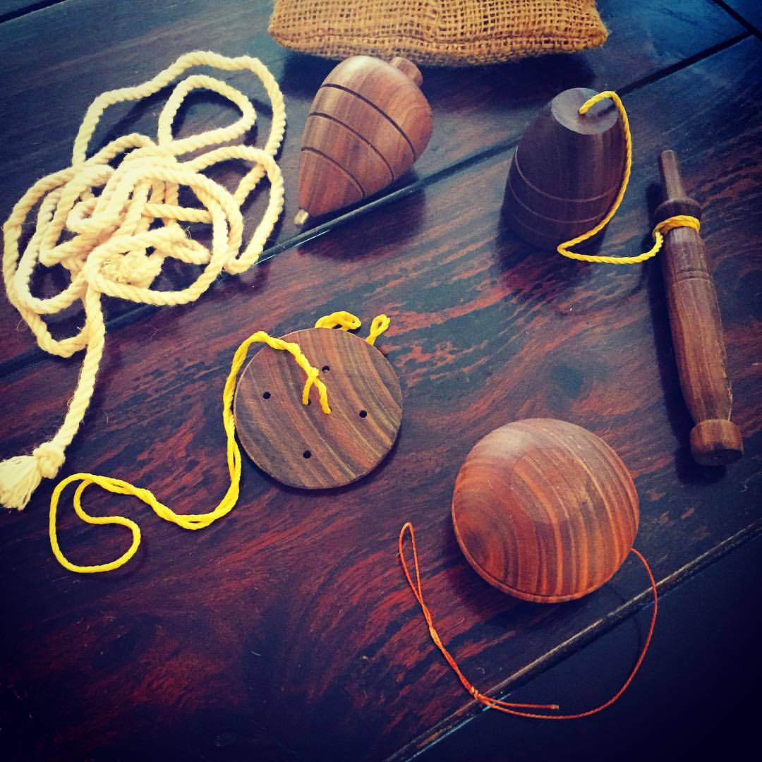 I grew up playing with this kind of toys. From the top left, clockwise: trompo, perinola, yoyo, and a gurrufío. They are Venezuelan traditional toys but you will likely find them in most Latin-American countries. I celebrate the memories of where I...