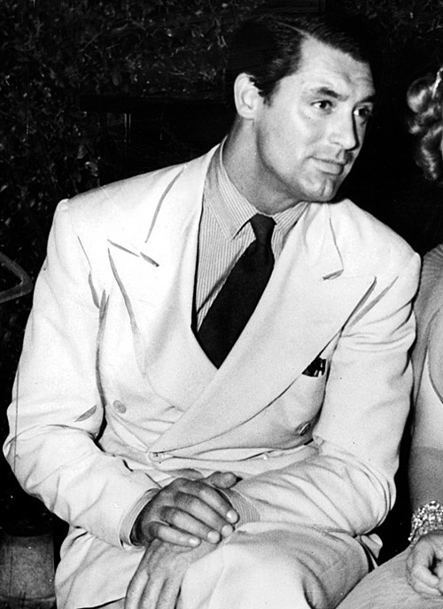 gregorypecks:Cary Grant in a formal summer look: light coloured double breasted suit, shirt, tie and