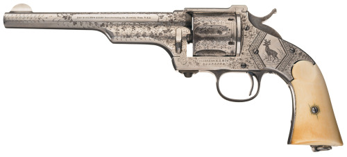 Custom engraved Merwin and Hulbert Co. single action revolver with carved ivory grips.Estimated Valu