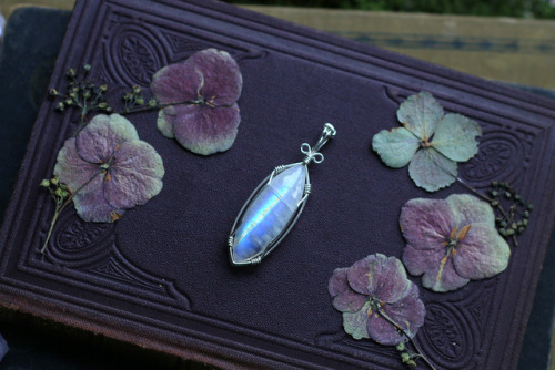 These are all the beautiful custom labradorite and rainbow moonstone pendants I made in sterling sil