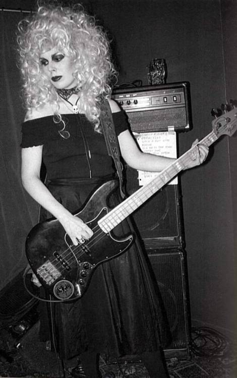 theunderestimator-2: Patricia Morrison in a Dolly Parton wig during a Fur Bible gig she did with Kid